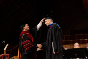 Dr. Abner Chou moving DJ Mattson's Tassle